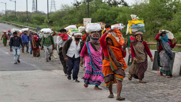 corona migrant workers march 600