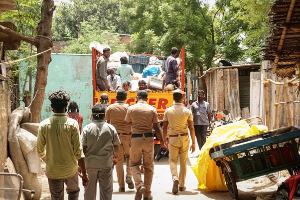 police in slum