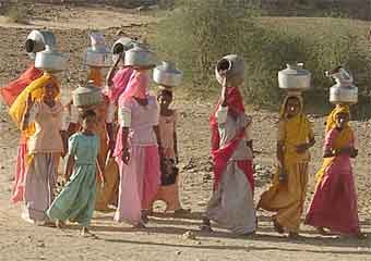 Indian women fetching water
